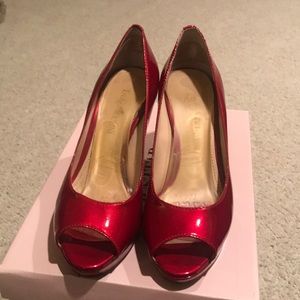Red patent heels